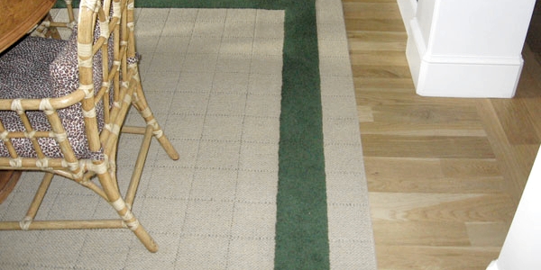 Area rug with carpet binding